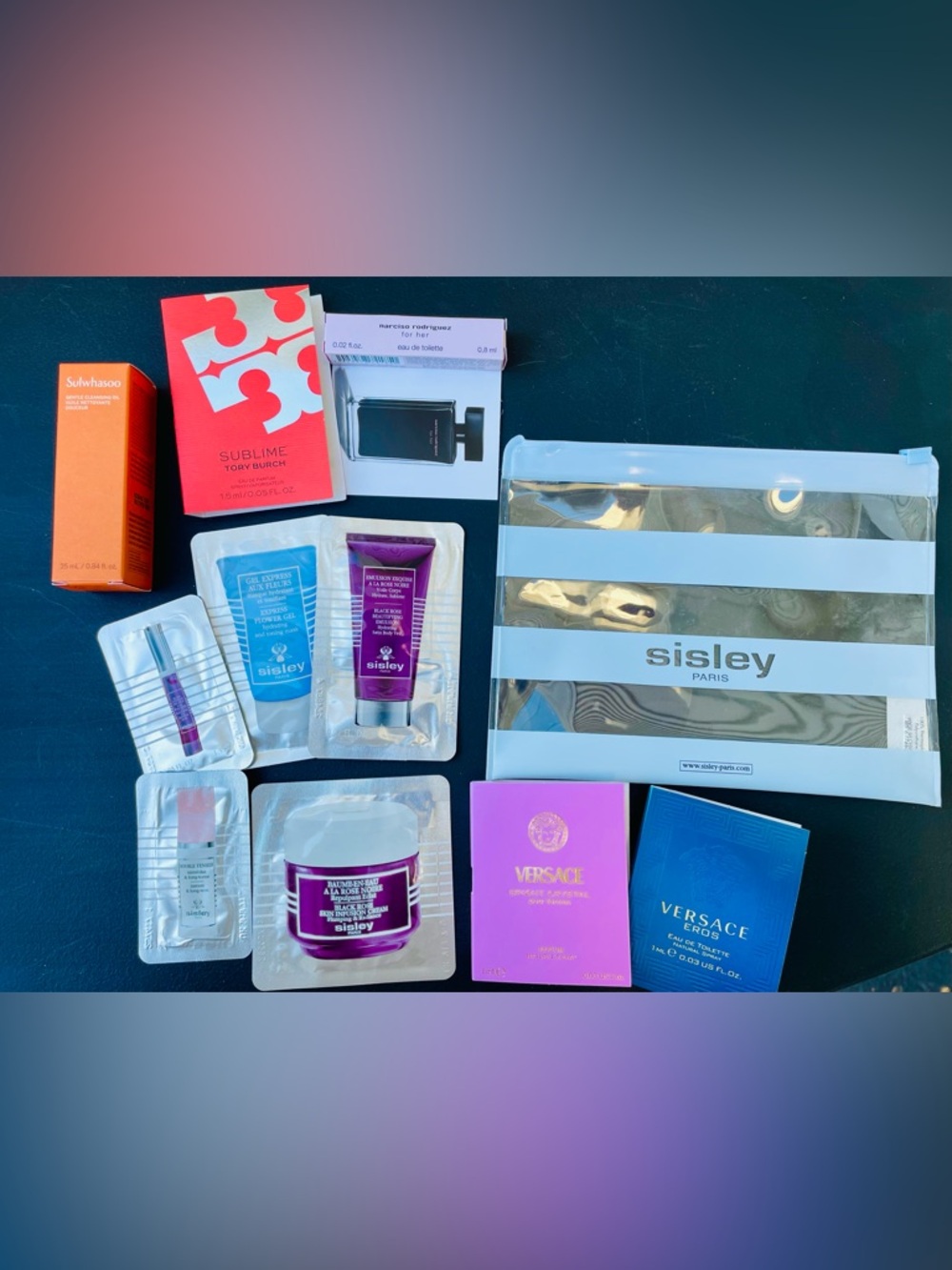 Sisley Paris pouch, skin care and luxury fragrance sample bundle